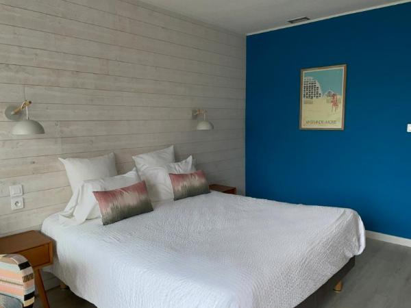 Hôtel Saint-Clair, côté Plage : photo 2 de la chambre chambre quadruple  - côté plage