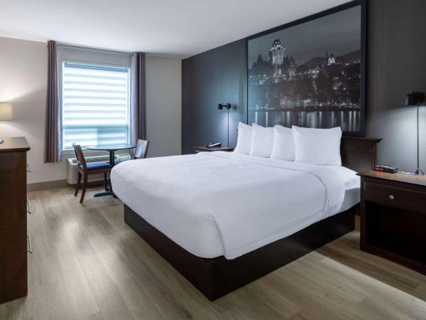 Super 8 by Wyndham Quebec City : photo 1 de la chambre chambre lit king-size - non-fumeurs