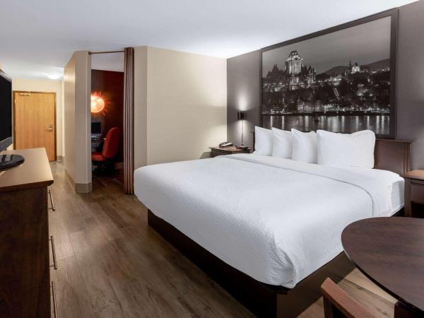 Super 8 by Wyndham Quebec City : photo 2 de la chambre suite lit king-size supérieure - non-fumeurs