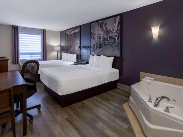 Super 8 by Wyndham Quebec City : photo 1 de la chambre suite lit queen-size de luxe - non-fumeurs