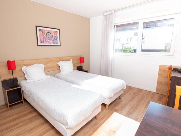 Apparthotel Privilodges Lyon Lumière : photo 2 de la chambre studio lits jumeaux 