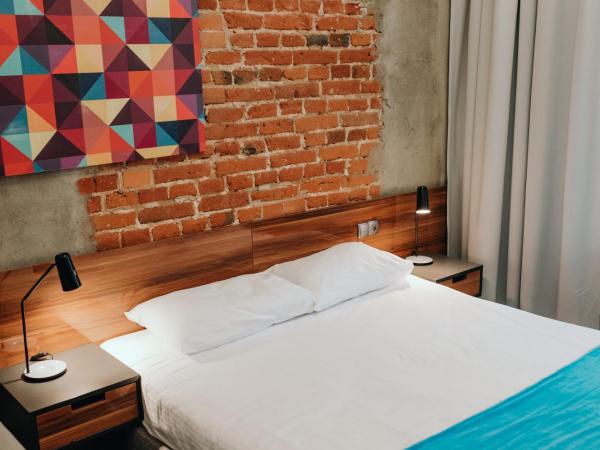 Hotel Tobaco Łódź : photo 5 de la chambre chambre double standard avec lit king-size