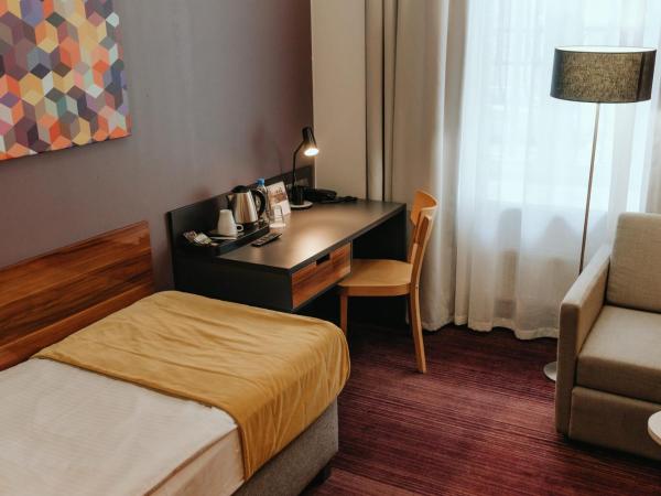 Hotel Tobaco Łódź : photo 2 de la chambre petite chambre simple