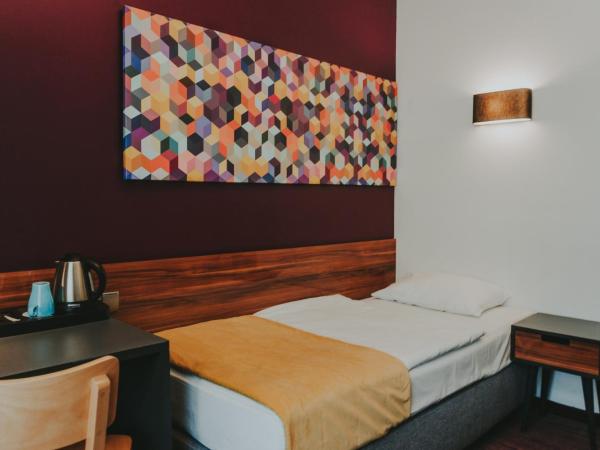 Hotel Tobaco Łódź : photo 4 de la chambre petite chambre simple