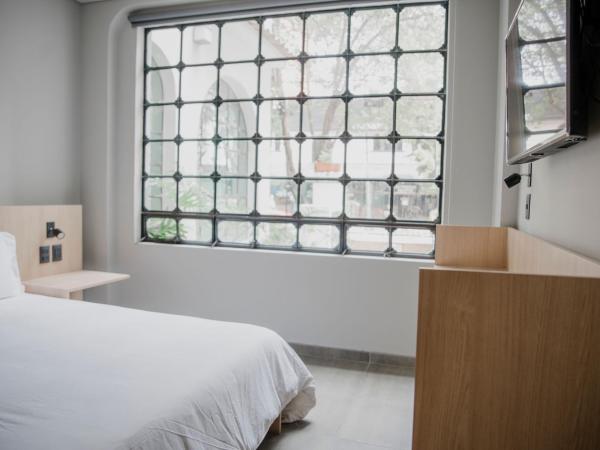 Casa Lomah WTC : photo 2 de la chambre chambre lit queen-size deluxe