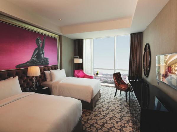 Hotel Ciputra World Surabaya managed by Swiss-Belhotel International : photo 5 de la chambre chambre lits jumeaux supérieure deluxe
