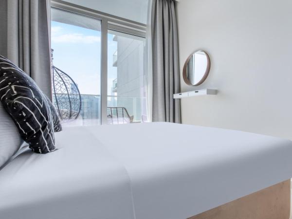 Reva Residences - One Bedroom Apartment by the S Holiday Homes : photo 3 de la chambre appartement 1 chambre