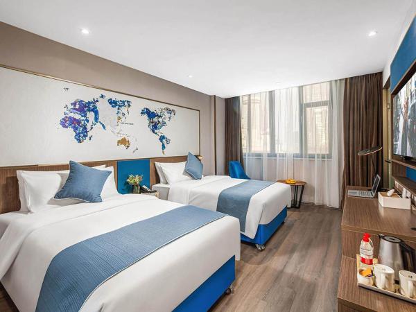 Kyriad Marvelous Hotel Wuxi Zhongshan Road Chong'an Temple : photo 1 de la chambre chambre lits jumeaux premium