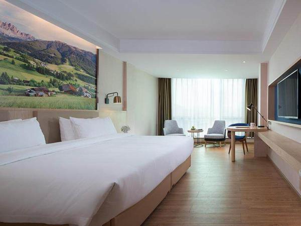 Kyriad Marvelous Hotel Dongguan Huangjiang Jingyi : photo 1 de la chambre enjoy double room without window
