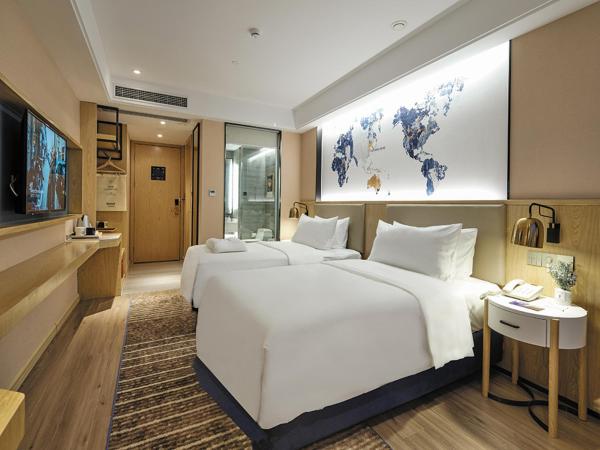 Kyriad Marvelous Hotel Suzhou Guanqian Street and Shiquan Street : photo 1 de la chambre chambre lits jumeaux premier
