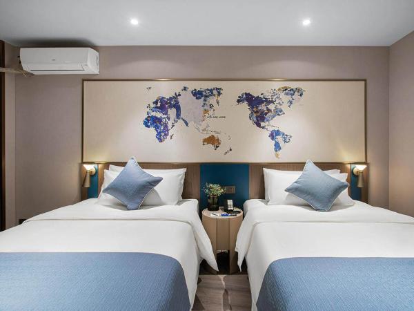 Kyriad Marvelous Hotel Wuxi Zhongshan Road Chong'an Temple : photo 3 de la chambre chambre lits jumeaux premium