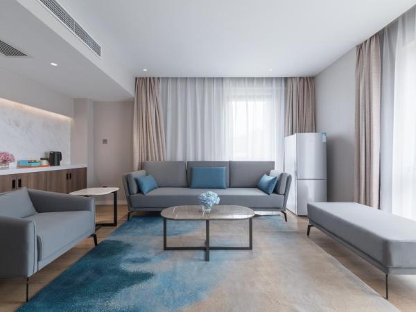 Holiday Inn Express Beijing Shijingshan Lakeview, an IHG Hotel : photo 1 de la chambre suite lit king-size 1 chambre avec cuisine