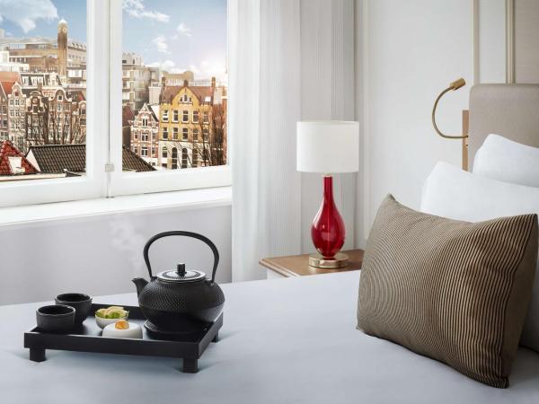 Tivoli Doelen Amsterdam Hotel : photo 3 de la chambre chambre de luxe double ou lits jumeaux avec vue sur le canal