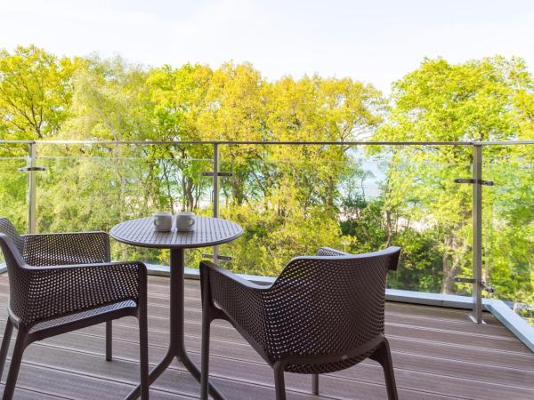 Diune Hotel by Zdrojowa : photo 8 de la chambre chambre double deluxe - vue partielle sur mer