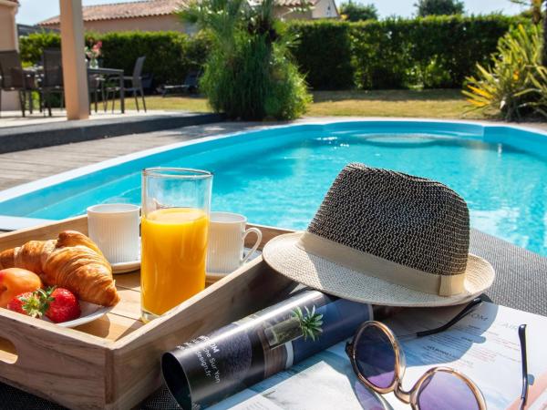 Oasis Les Jardins des Sables d'Olonne : photo 4 de la chambre villa 4 chambres avec piscine privée