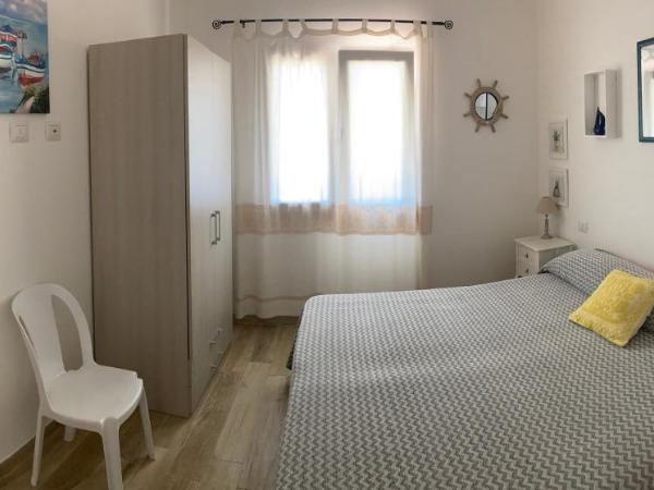 Punta Sirenella : photo 1 de la chambre chambre double ou lits jumeaux avec salle de bains privative