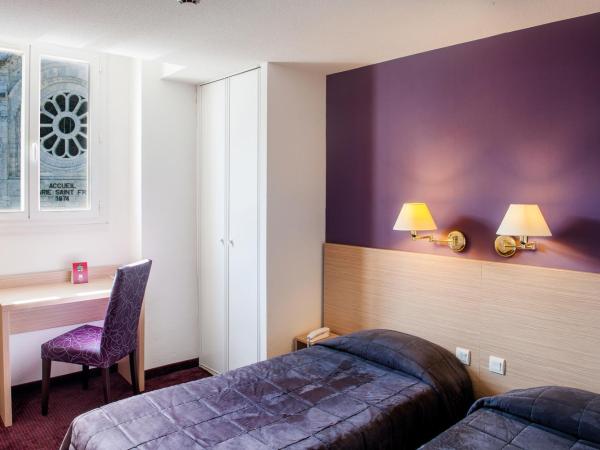 Hôtel Continental : photo 3 de la chambre chambre lits jumeaux