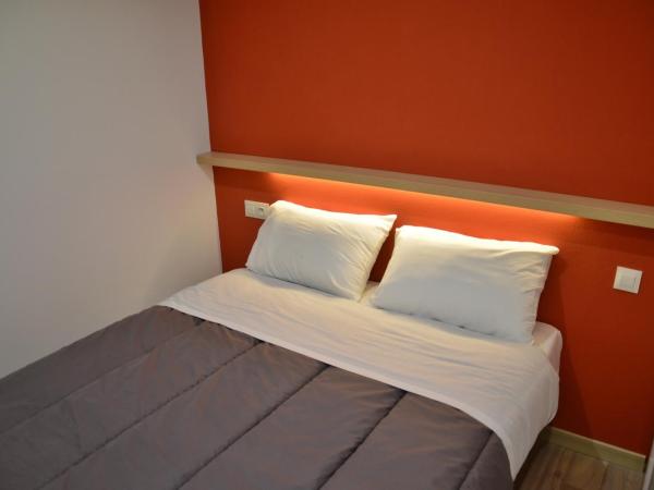 Eklo Hotels Le Havre : photo 1 de la chambre chambre familiale adaptée aux personnes à mobilité réduite