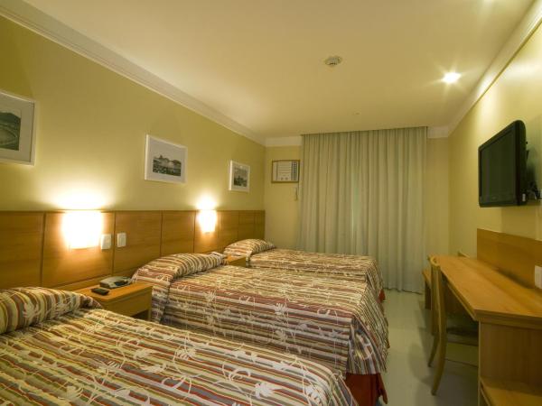 Hotel Atlântico Business Centro : photo 1 de la chambre chambre triple standard