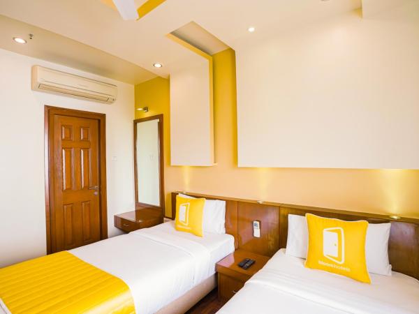 BloomSuites I Electronics City : photo 1 de la chambre chambre lits jumeaux deluxe