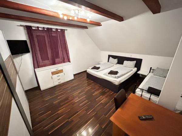 Pension Günther : photo 3 de la chambre chambre triple deluxe