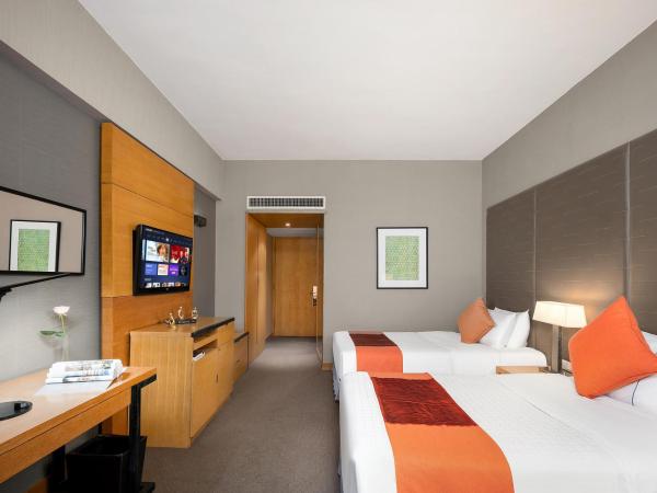 Jianguo Hotel Guangzhou : photo 1 de la chambre chambre lits jumeaux supérieure