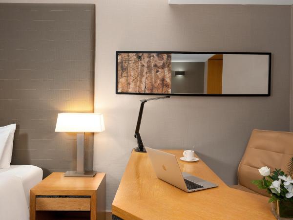 Jianguo Hotel Guangzhou : photo 1 de la chambre chambre lits jumeaux deluxe