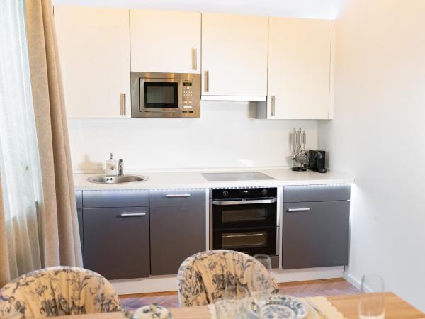 SCHLOSSRESIDENZ - Boutique Apartments & Hotel Suiten : photo 7 de la chambre chambre double deluxe avec lit d'appoint