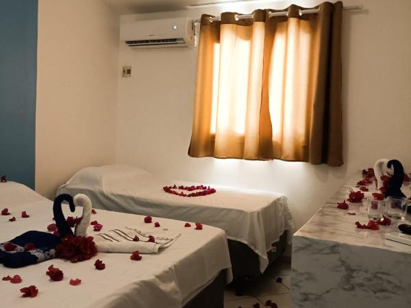 Pousada Ponta Negra : photo 1 de la chambre chambre triple deluxe