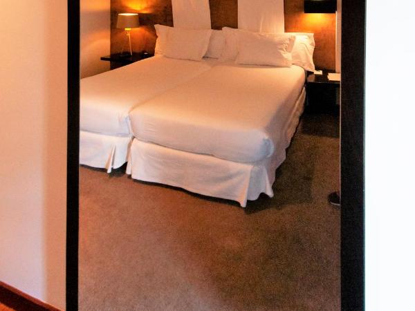 Porto Trindade Hotel : photo 1 de la chambre chambre lits jumeaux