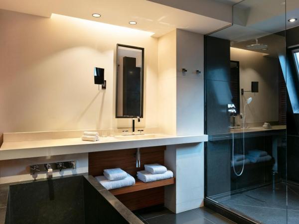 Le Metropolitan Paris Tour Eiffel, a Tribute Portfolio Hotel : photo 1 de la chambre suite lit king-size junior