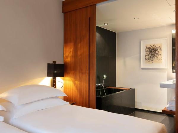 Le Metropolitan Paris Tour Eiffel, a Tribute Portfolio Hotel : photo 3 de la chambre suite junior avec 2 lits jumeaux/simples