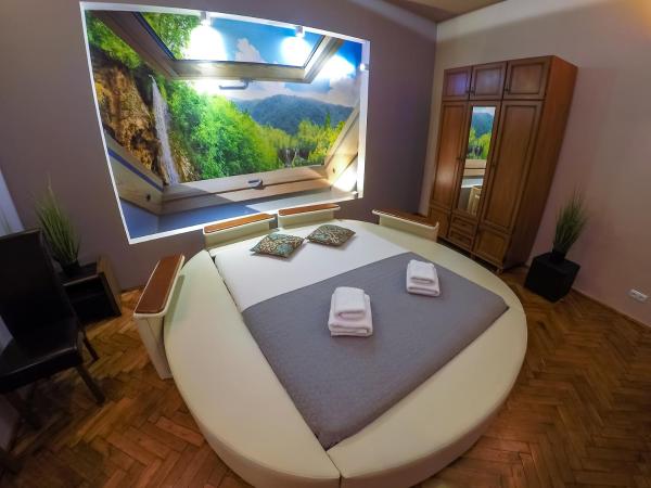 Apartament z jacuzzi Kraków Rynek : photo 5 de la chambre suite lit queen-size avec baignoire spa