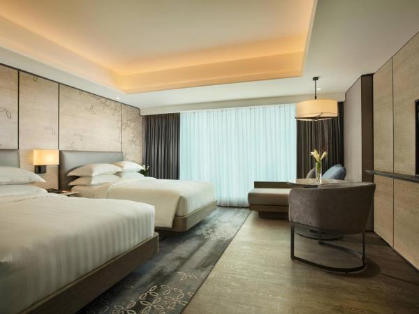 Yogyakarta Marriott Hotel : photo 1 de la chambre chambre avec 2 lits doubles - vue sur ville