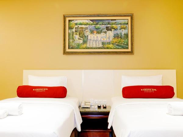 BI Executive Hotel : photo 2 de la chambre chambre lits jumeaux