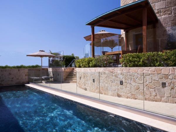 Bellevue On The Beach Suites : photo 1 de la chambre suite the windmill