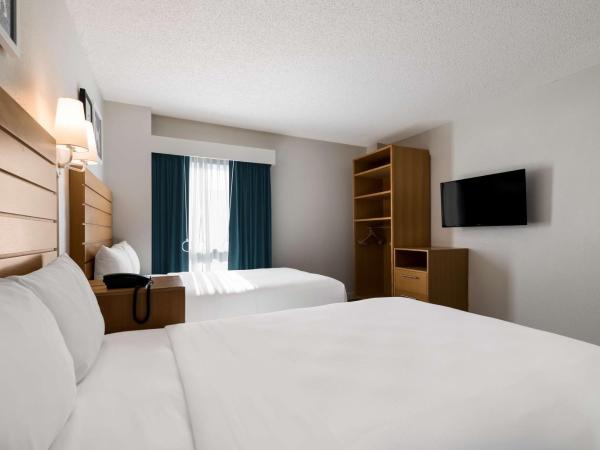 Sonesta ES Suites Orlando International Drive : photo 4 de la chambre suite 2 chambres avec lit king-size et 2 lits doubles