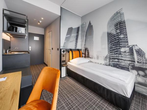 Hotel Lützow : photo 1 de la chambre chambre simple urbaine