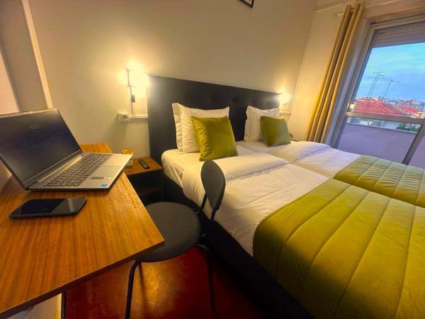 LISABONNA GUEST HOUSE : photo 2 de la chambre chambre lits jumeaux avec salle de bains commune