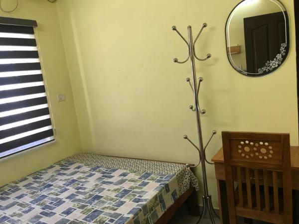 Gods own home stay : photo 4 de la chambre chambre double Économique
