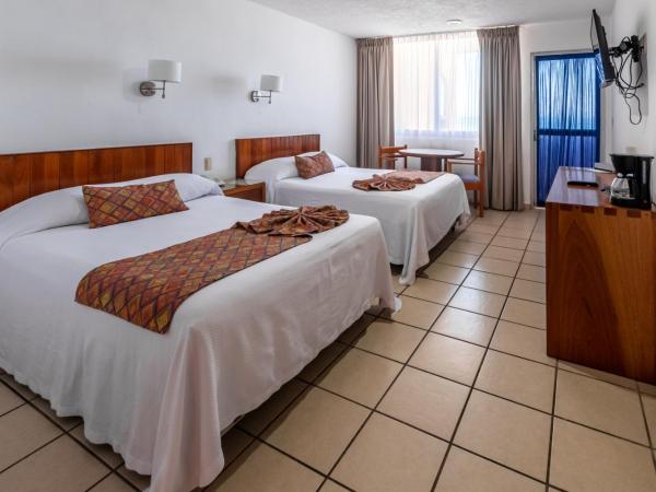 Costa de Oro Beach Hotel : photo 1 de la chambre chambre double standard