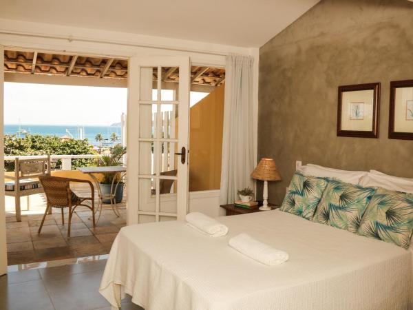 Pousada Baía Bonita : photo 1 de la chambre suite lit king-size - vue sur mer