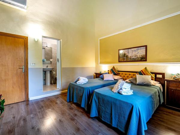 Hotel Minerva : photo 1 de la chambre chambre double ou lits jumeaux