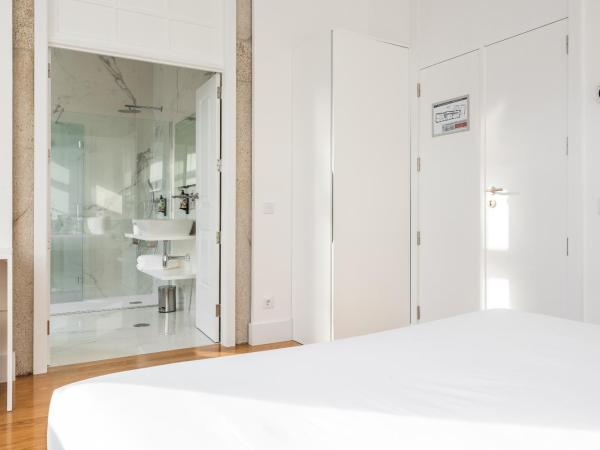 Avenida Viana Boutique Suites : photo 4 de la chambre chambre double