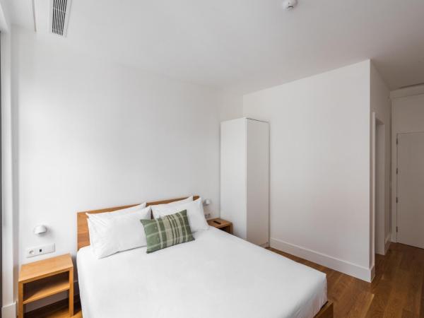 Avenida Viana Boutique Suites : photo 2 de la chambre chambre double avec balcon