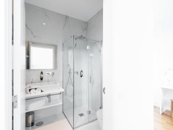 Avenida Viana Boutique Suites : photo 5 de la chambre chambre double