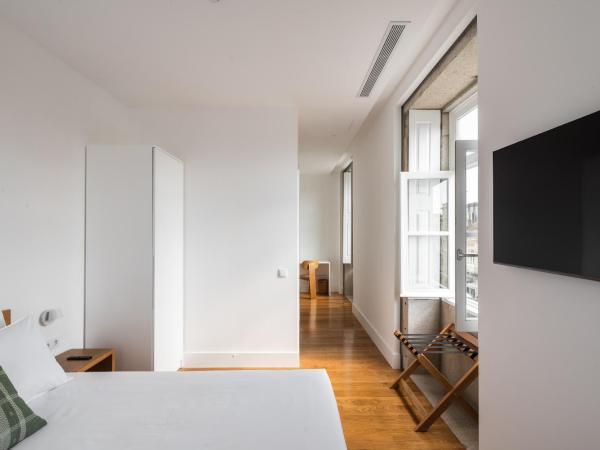 Avenida Viana Boutique Suites : photo 2 de la chambre chambre double