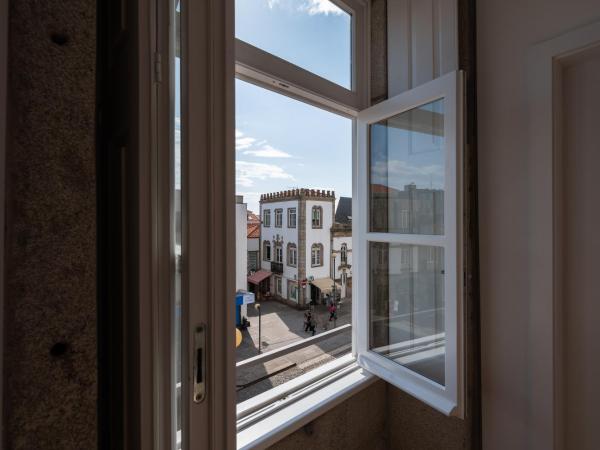 Avenida Viana Boutique Suites : photo 3 de la chambre chambre lits jumeaux