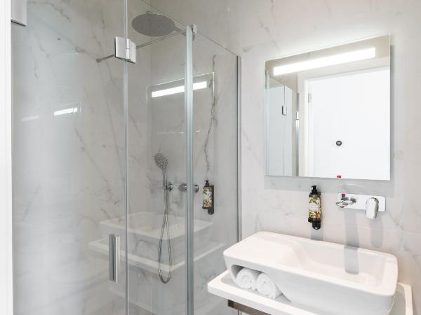 Avenida Viana Boutique Suites : photo 6 de la chambre chambre lits jumeaux supérieure