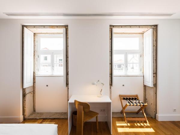 Avenida Viana Boutique Suites : photo 3 de la chambre chambre lits jumeaux supérieure